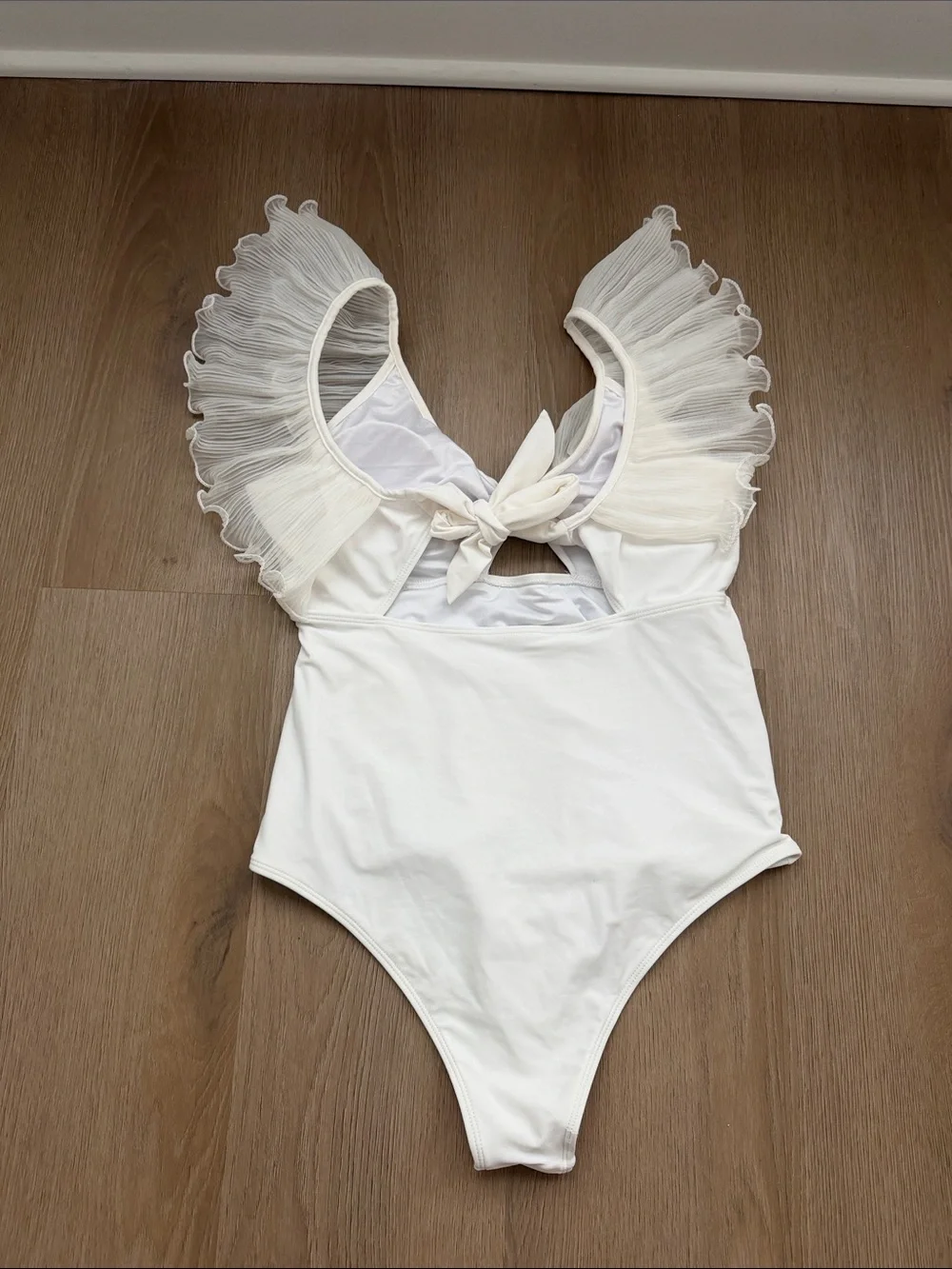 White Ruffle V-Front One-Piece swimsuit
